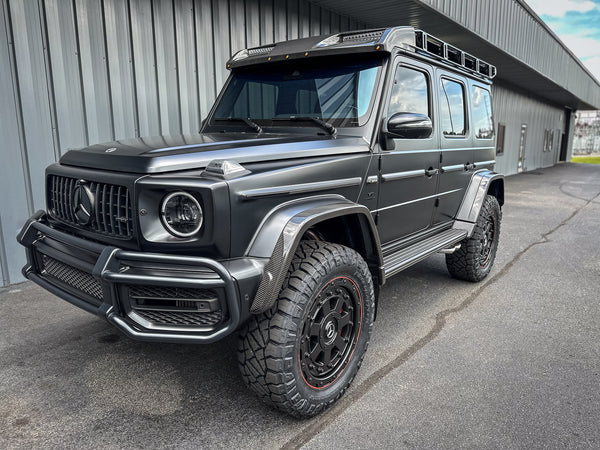 Load image into Gallery viewer, Mercedes G Wagon amg g63 4x4 squared Black Wheels 8x6.5 off road red lip 463 industries GC01