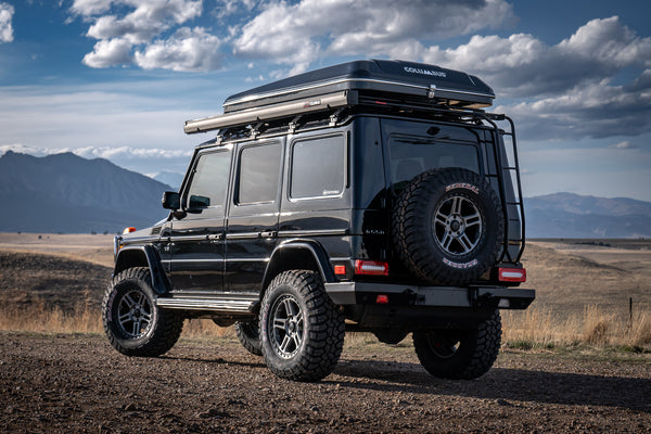 Load image into Gallery viewer, mercedes g wagen 4 inch lift kit 100mm lift kit for Mercedes G Wagon G Wagen Gelandewagen Jack Wagon Overlanding Suspension Mercedes Benz w463 w461 w460 G500 G550 G55 G63 AMG Alpha Equipt Grenade Wheels Light Grey 18 inch wheels 35 inch tires