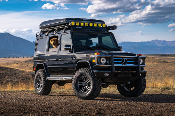 Load image into Gallery viewer, mercedes g wagen 4 inch lift kit 100mm lift kit for Mercedes G Wagon G Wagen Gelandewagen Jack Wagon Overlanding Suspension Mercedes Benz w463 w461 w460 G500 G550 G55 G63 AMG Alpha Equipt Grenade Wheels Light Grey 18 inch wheels 35 inch tires
