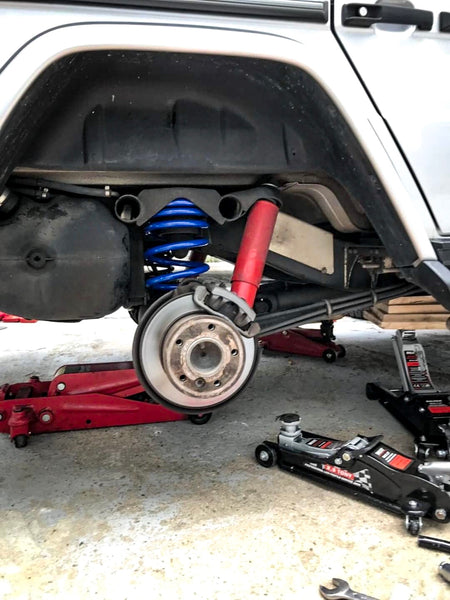 Load image into Gallery viewer, mercedes benz g wagon koni raid shocks and orc eibach springs with no tire