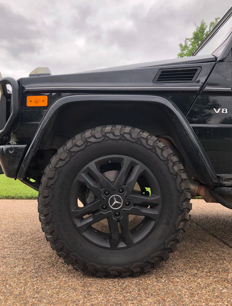 Load image into Gallery viewer, koni raid red shocks from mercedes benz g wagon 2 inch lift installed