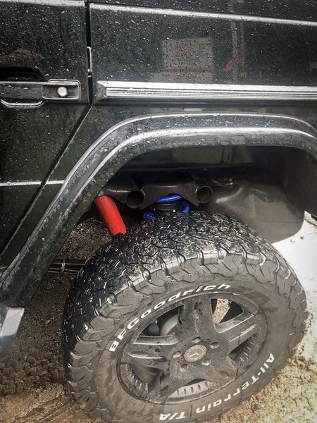 Load image into Gallery viewer, mercedes benz g wagon koni raid red shocks rear 2 inch lift