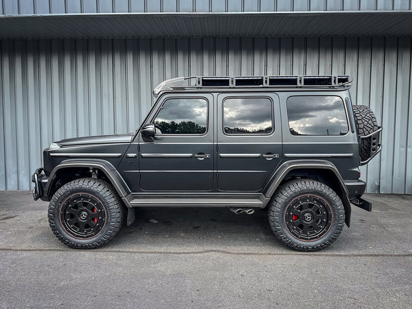 Load image into Gallery viewer, Mercedes G Wagon amg g63 4x4 squared Black Wheels 8x6.5 off road red lip 463 industries GC01
